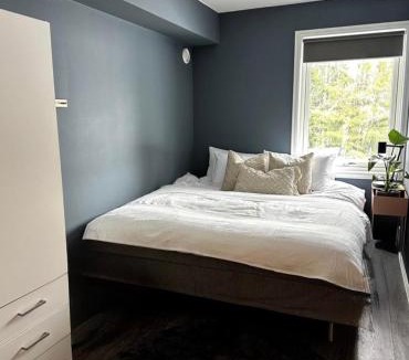 Ullensaker Apartment | Apartment near Gardermoen and downtown with parking and view over the creek in the garden