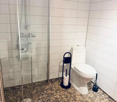 Ullensaker Apartment | Apartment near Gardermoen and downtown with parking and view over the creek in the garden