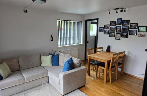 Vossestrand Apartment | Apartment with terrace, pool, sauna, and free parking