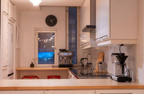 Keskinen District Villa | Architectural townhouse with sauna and patio