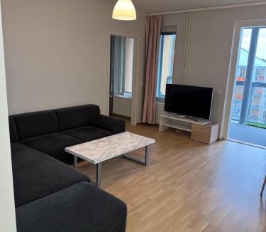 Itainen District Apartment | Aurinkolahti Modern Apartment close to nature - Heated EV Parking Balcony