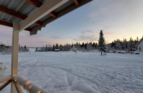 Jukkasjarvi House | Aurora River Camp Glass igloos & cabins