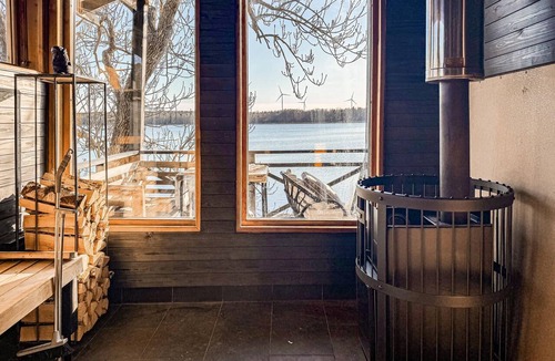 Herrang House | Beach front home in Herräng with sauna