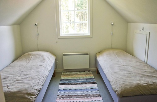 Vittsjo House | Beautiful cottage with fireplace for cool evenings.