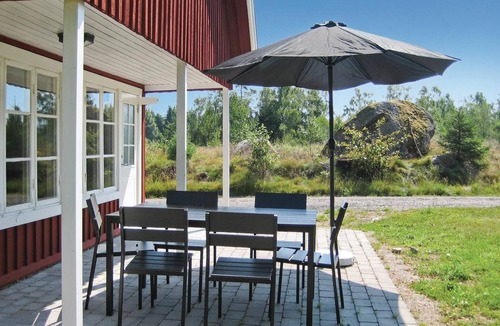 Vittsjo House | Beautiful cottage with fireplace for cool evenings.