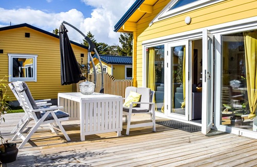 Gislov House | Beautiful wooden house with inviting flair and large outdoor area.