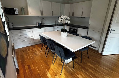 Flekkerøy Apartment | Bright Apartment with Patio and Garden