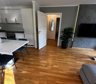 Flekkerøy Apartment | Bright Apartment with Patio and Garden