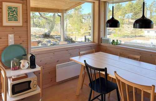 Halden House | Bright cabin with nature plot by the Oslofjord