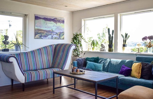 Bomlo House | Bright cottage with panoramic view and own boat, beautifully located on a small hill just 30 meters