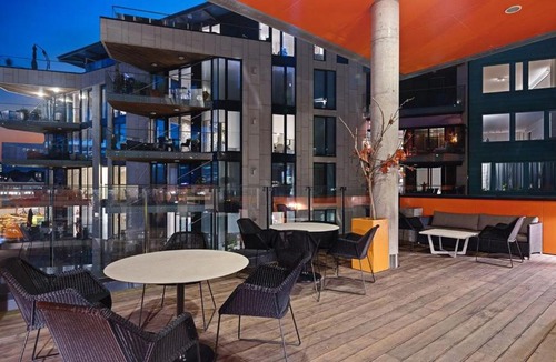 Tjuvholmen Apartment | Bright & exclusive 1BR in Prime Location, located on water in Oslo center with see view to Oslo fjord