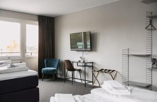 Hova Hotel | BriQ Hotell