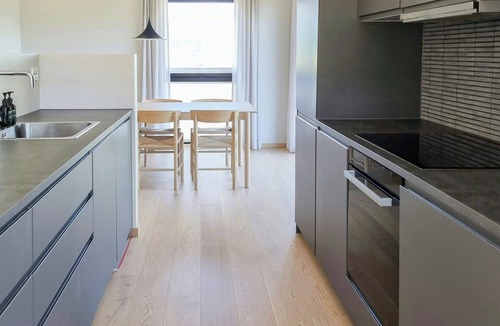 Hjelmeland House | Cabin by the fjord with rooftop terrace on Randøy