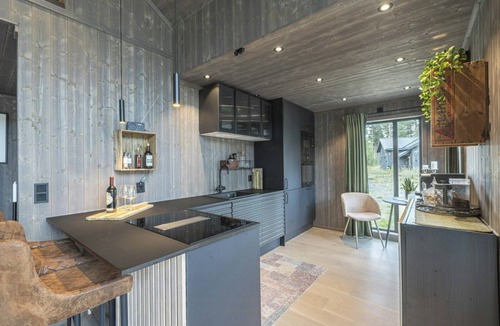 Kroderen House | Cabin by the river with private terrace