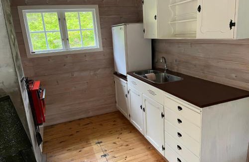 Snillfjord House | Cabin with boat close to the sea, Hitra municipality