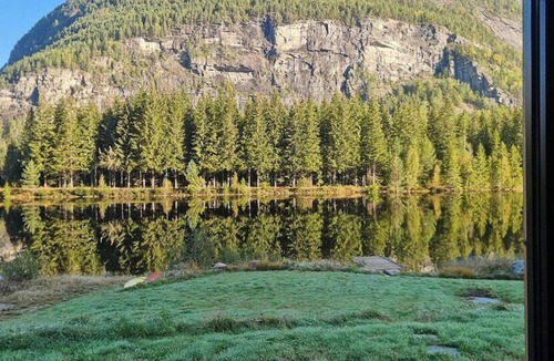 Bygland House | Cabin with dock by Otra in Setesdal