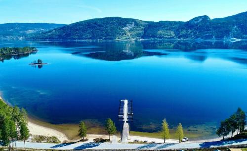 Nissedal House | Cabin With Two Living Rooms By Lake Nisser