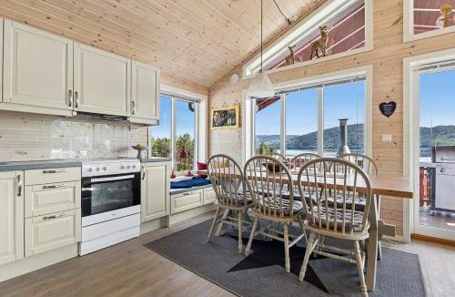 Nissedal House | Cabin With Two Living Rooms By Lake Nisser