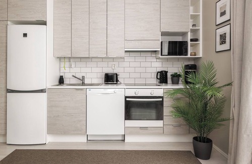 Pori Apartment | Calm Design Studio | Balcony & Parking