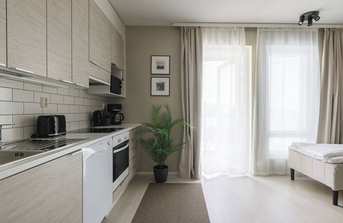 Pori Apartment | Calm Design Studio | Balcony & Parking