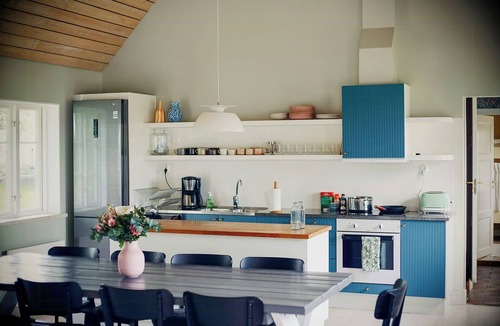 Lervik House | Charming coastal house with yoga studio and stream