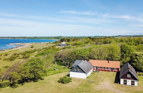 Lervik House | Charming coastal house with yoga studio and stream