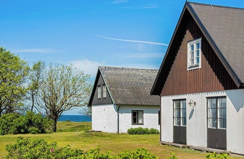 Lervik House | Charming coastal house with yoga studio and stream