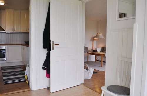 Kristinehamn House | Charming cottage with fireplace and lake view.
