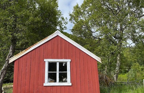 Torsken Cottage | Charming cottage with seaview in Senja