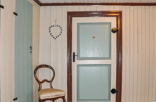Svarta House | Charming old style house with quaint paintings from earlier times.