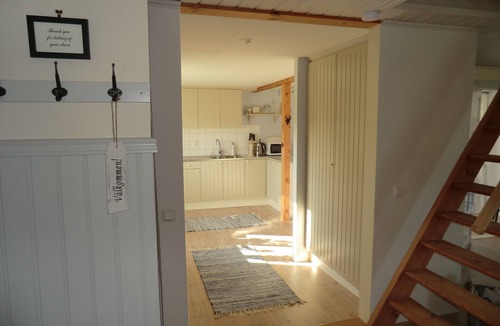 Laholm Cottage | Charming red cottage on the Swedish countryside, near the sea and forest.
