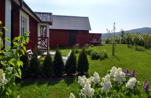 Laholm Cottage | Charming red cottage on the Swedish countryside, near the sea and forest.