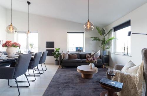 Bastad House | Chocolaty Warmth Home 3BR Flat with Cozy Balcony
