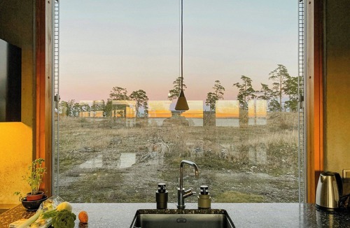 Farosund House | Cliff house with sea views in Bungenäs