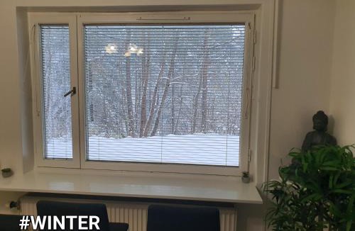 Hasselby Apartment | Close to the metro and the beach! with a view of the Scandinavian forest