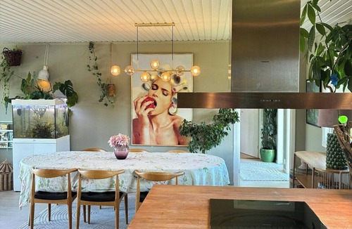 Moss House | Colourful home with lush garden on Jeløy