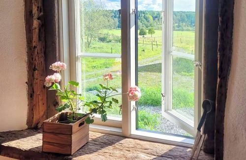 Nora Municipality House | Converted barn with grass roof in Lindesby