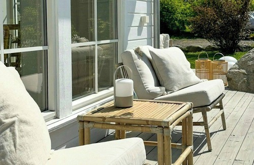Hvasser House | Cottage with flower garden and veranda on Hvasser
