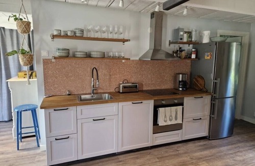 Borlange Apartment | Countryside, two-level studio, built in an old barn.