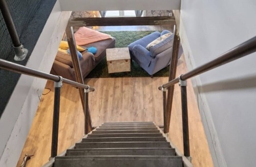 Borlange Apartment | Countryside, two-level studio, built in an old barn.