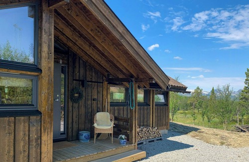 Al House | Cozy cabin with mountain views in Oppheimåsen