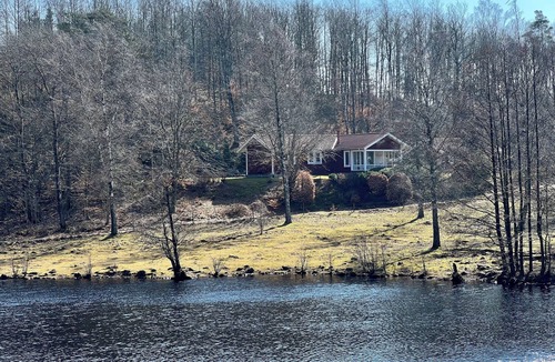 Oppinge House | Cozy vacation home with a view of the water and forest. Pet friendly.