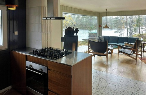 Askland House | Design cabin by mountain lake in Rukkedalen