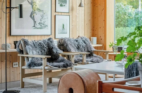 Grimeton House | Designer farm with sauna by stream in Halland
