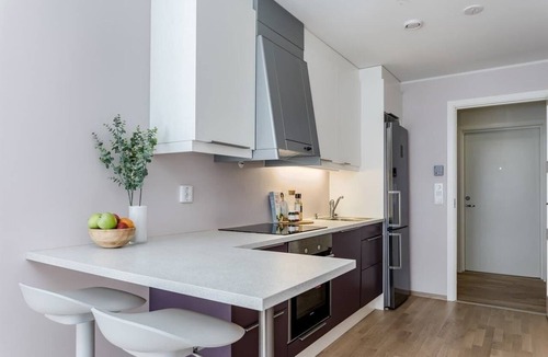 Arstad Apartment | DV86 - 1BR Modern City Retreat