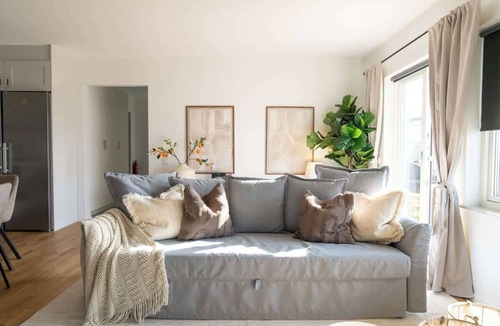 Bastad Condo | Earthy Ground Floor Home Patio Sunbeds Greenery