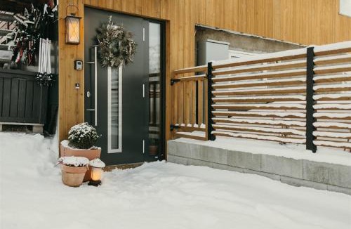Tromso Apartment | EIRA Fjord Stay with firepit, snowmobile rental and free snowshoes