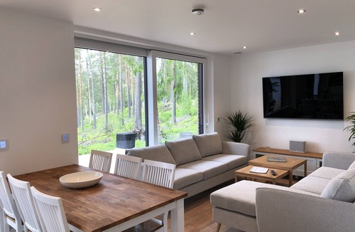 Arvika House | Exclusive and modern vacation home "Stora älg" directly on the lake 365 days a year!