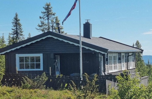 Sor-Aurdal House | Family cabin with firepit at Søndre Fjellstølen