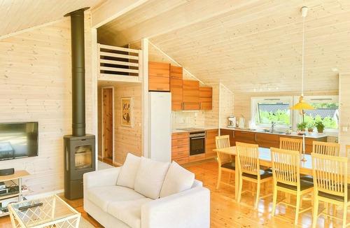Gressvik House | Family cabin with panoramic windows by Oksrødkilen